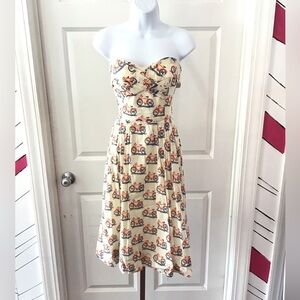 Vintage-Inspired Cream Dress with Scooter Print